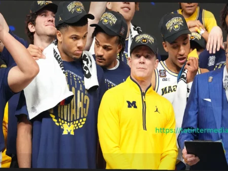 Mavericks hiring Dusty May away from Michigan in basketball stunner